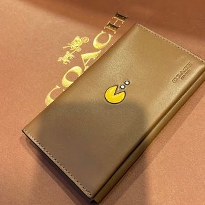 Small phone case wallet. PACMAN x COACH unisex